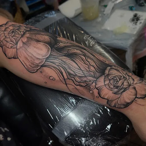Work by Acid Ink Tattoos