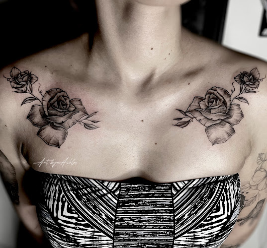 Work by Rose Stem Tattoo
