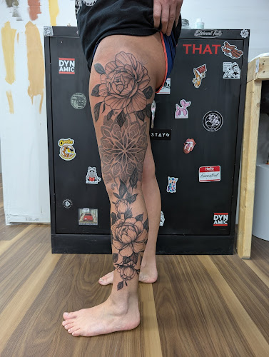 Work by Covered Tattoo Shop