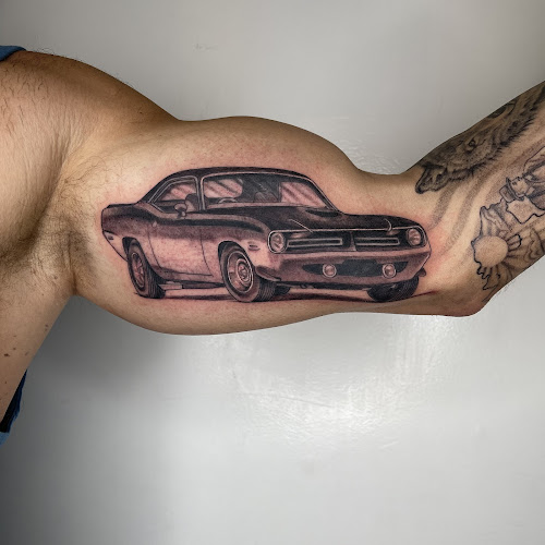 Work by Lincoln Tattoo Company
