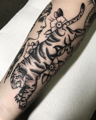 Work by Black Penny Tattoo