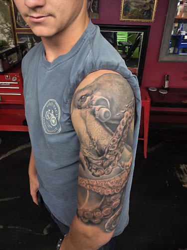 Work by M'Ink House Tattoo, Piercing, Jewelry