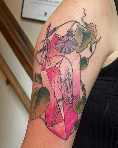 Work by Trickster Coyote Tattoo