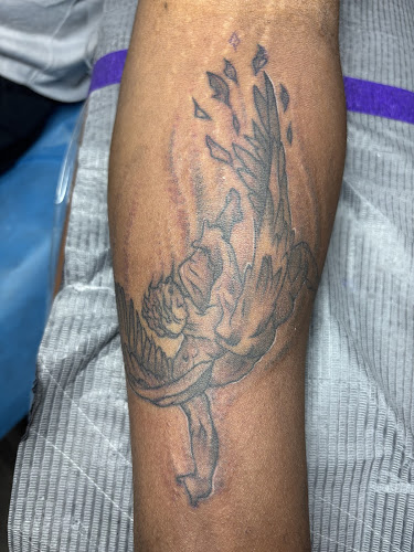 Work by Virginia Beach Ink Tattoo and Piercing Studio