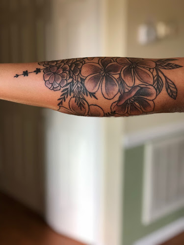 Work by Revelation Ink Tattoo and Piercing
