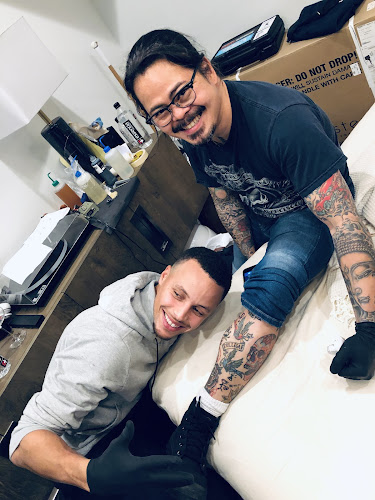 Work by Zebra Tattoo & Body Piercing