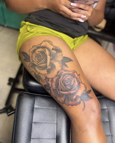 Work by Pen & Portrait Tattoos