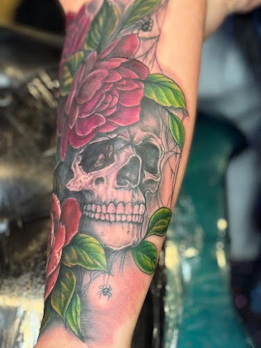 Work by Devine Line Tattoos & Body Piercings