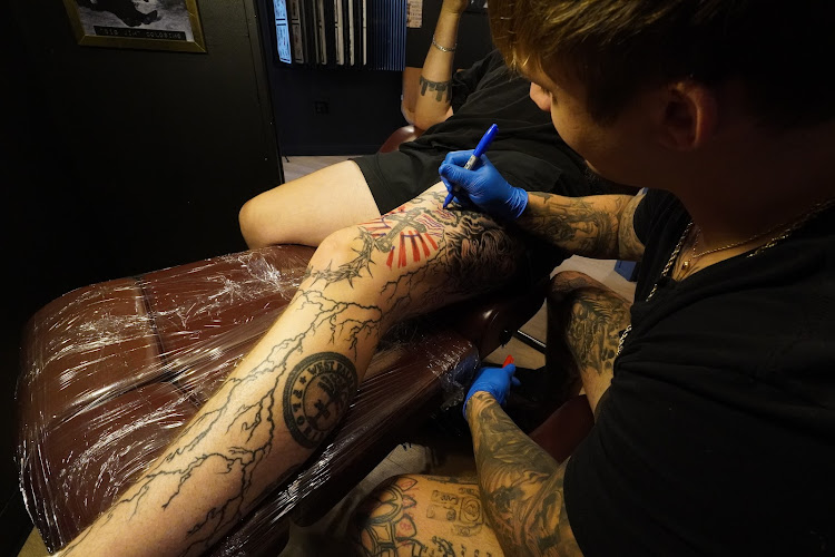 Work by Bound by Blood Tattoo Studio