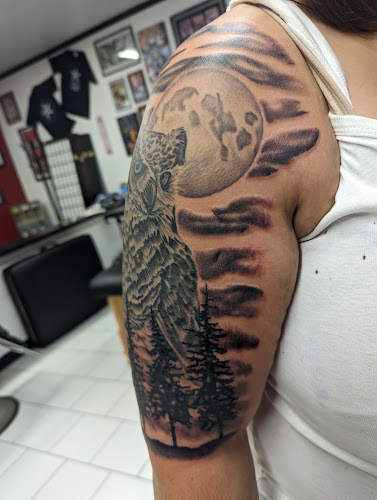 Work by Homeward Bound Tattoo
