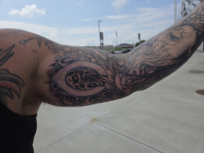 Work by Queen City Tattoos