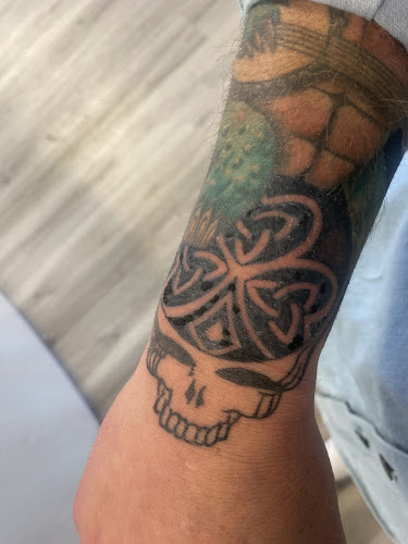 Work by Shamrock Tattoo Company