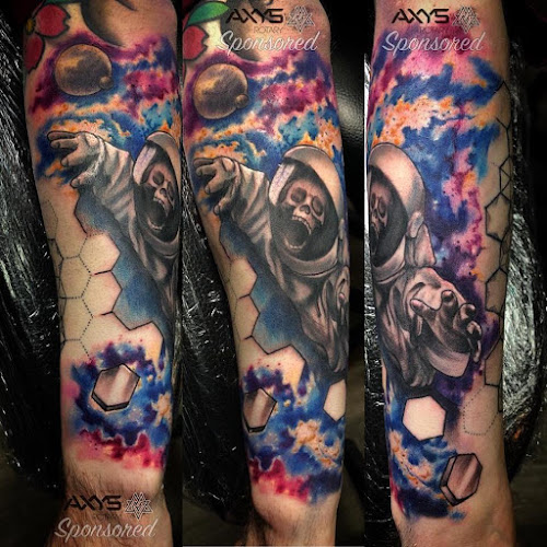 Work by Holy Ground Tattoo