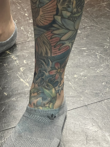 Work by Pisst Fish Tattoo Co