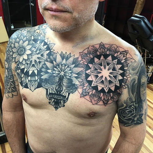 Work by Brothers Keeper Tattoo Studio