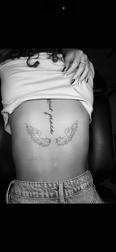 Work by PeerlessLines Fine Line Tattoos