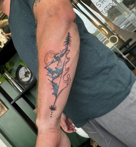 Work by Stray Dogs Tattoo Studio