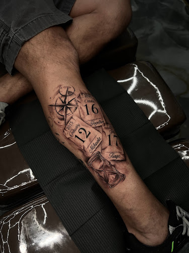 Work by Dom Astro Tattoo Company
