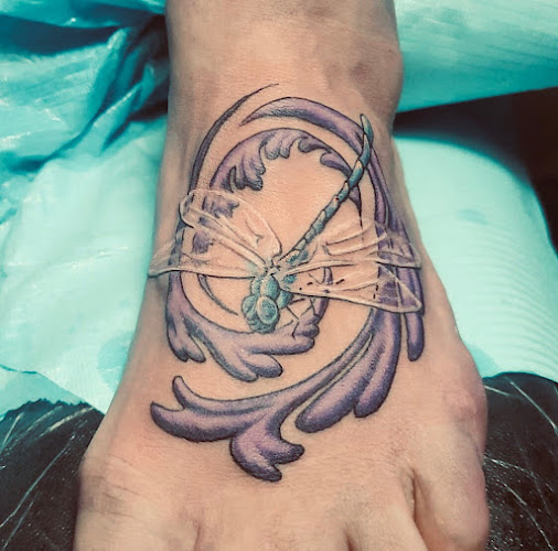 Work by Lovely Monkey Tattoo