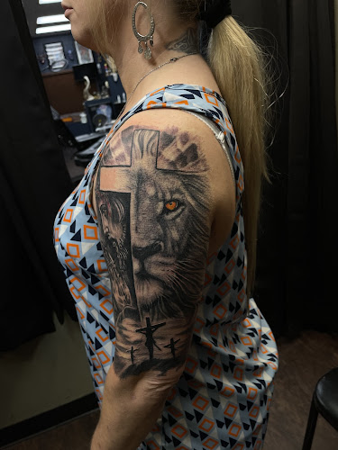 Work by Half Pint Tattoo Studio