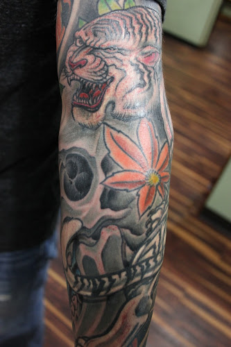 Work by Dead Serious Tattoos