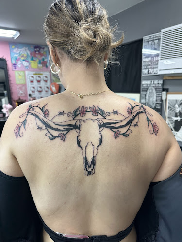 Work by Rubber Monkey Tattoo Shop