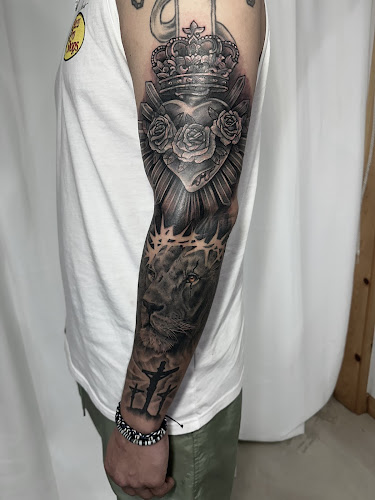 Work by State of the Art Tattooing