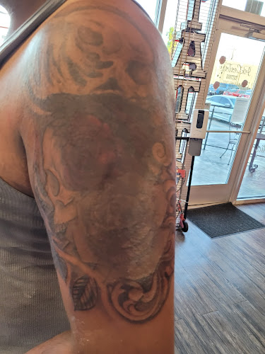 Work by Dirty Looks Tattoo Studio