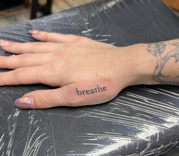 Work by Str8 Line Tattoo