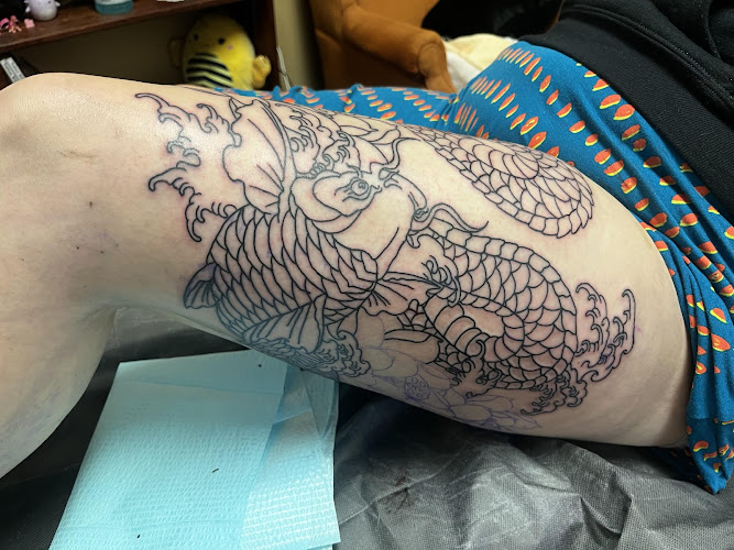 Work by Garry's Skin Grafix Tattoo Studio
