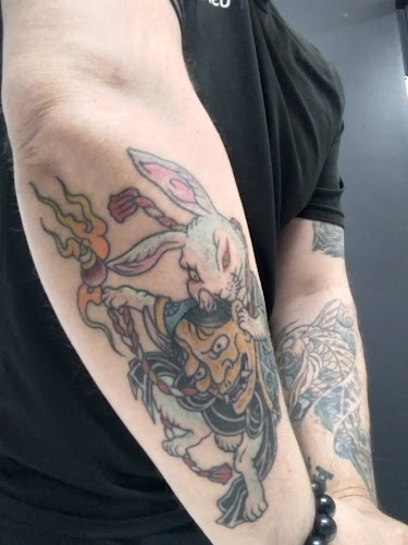 Work by Point Blank Tattoo