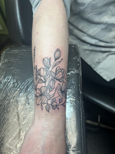 Work by Ink and Poke Tattoos