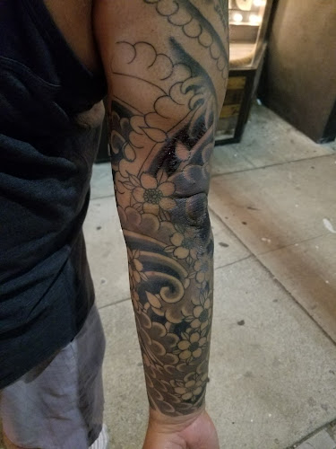 Work by Oak & Poppy Tattoos & Piercings