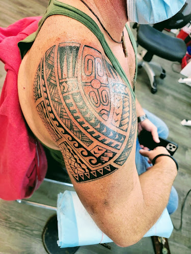 Work by Moving Pictures Tattoo Studio