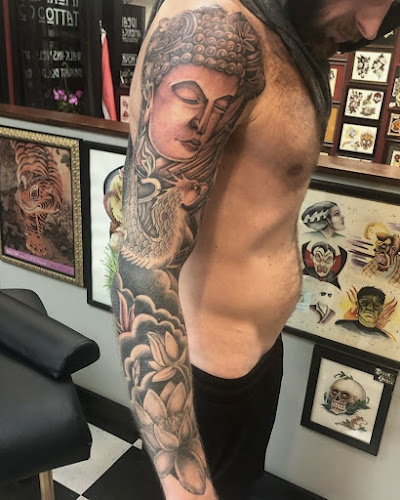 Work by Ideal Americana Tattoo Company
