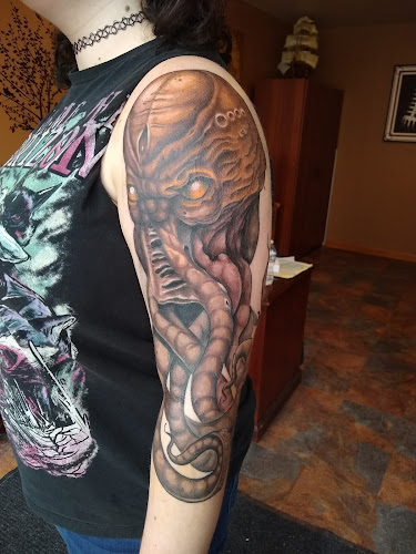 Work by Main Street Tattoo and Rachell's Massage
