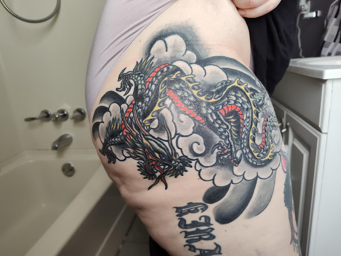 Work by Mothra Tattoo Studios