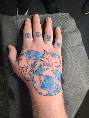 Work by Constrictor Tattoo
