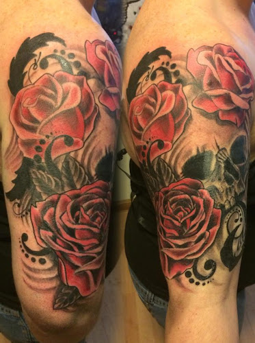 Work by Dropped Anchor Tattoo